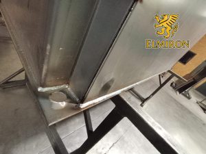 Industrial steel welding joint on structural metal framework – Elmiron