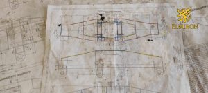 Metal construction welding in industrial hall